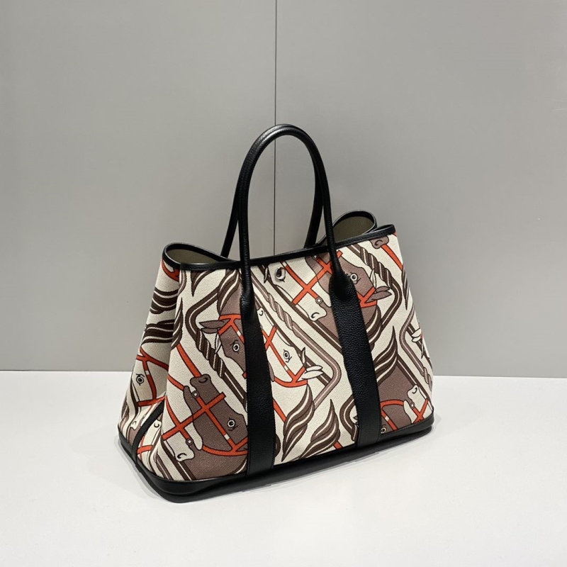 H**mes shopping bags